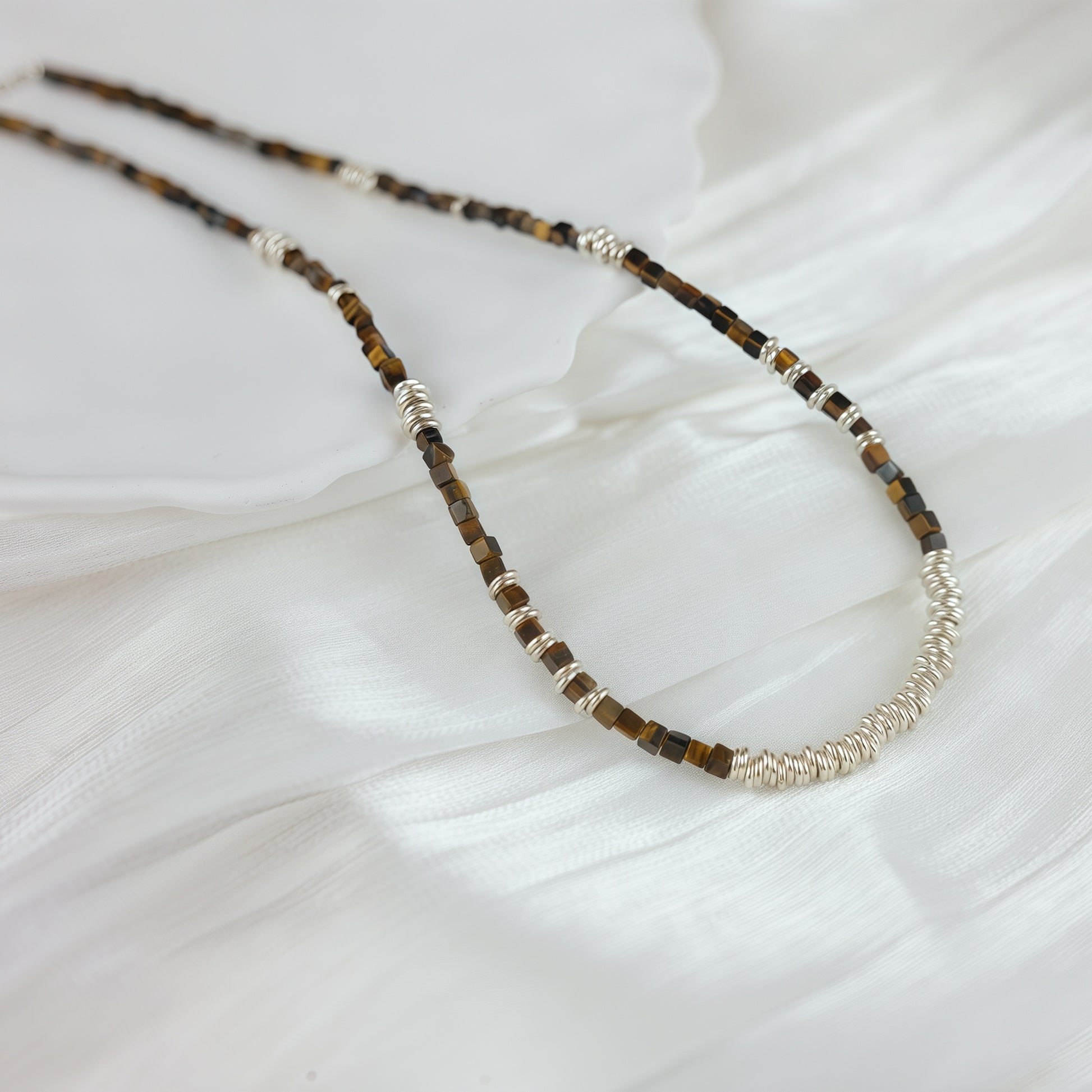 Sterling silver necklace paired with tiger’s eye stones & silver rings - Tora