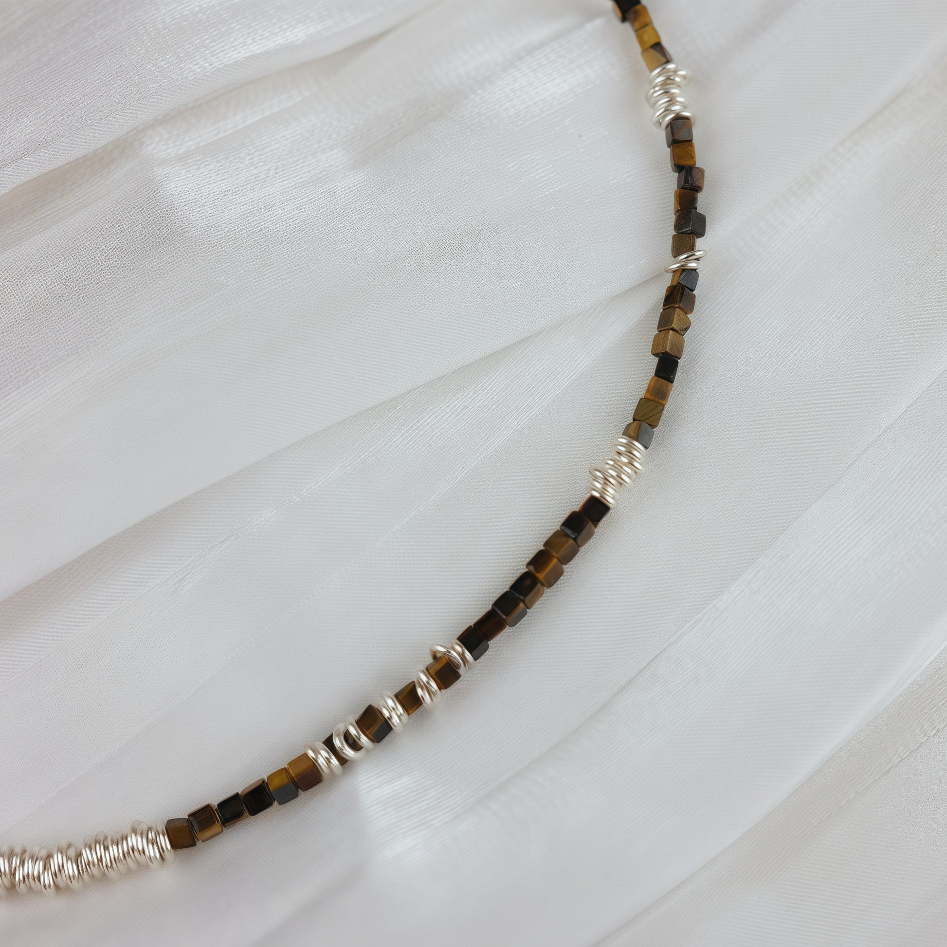 Sterling silver necklace paired with tiger’s eye stones & silver rings - Tora