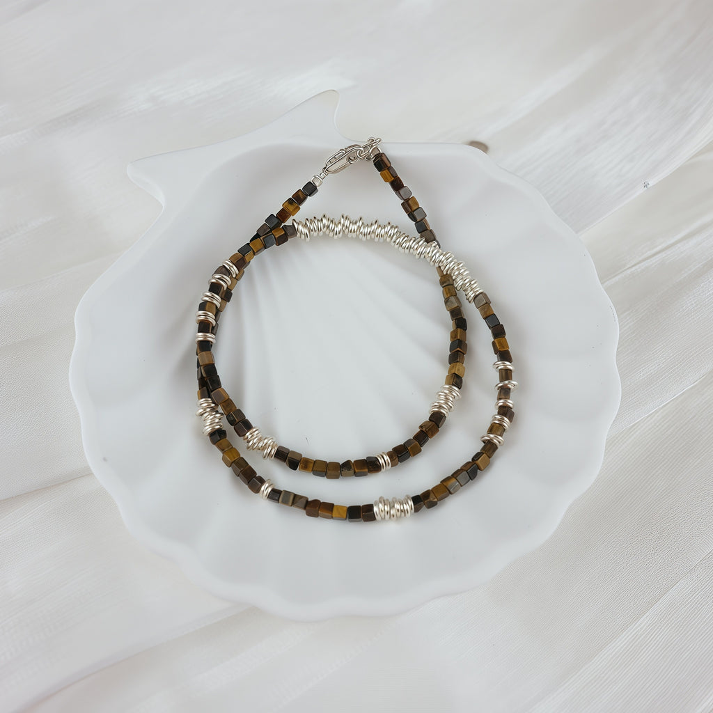 Sterling silver necklace paired with tiger’s eye stones & silver rings - Tora